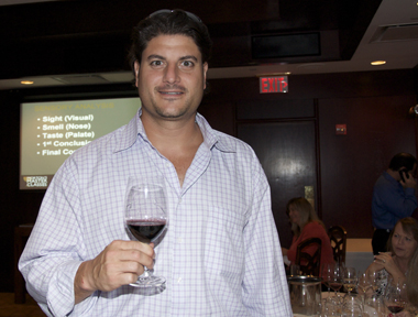 Mike Sipping wine at Mortons Steakhouse